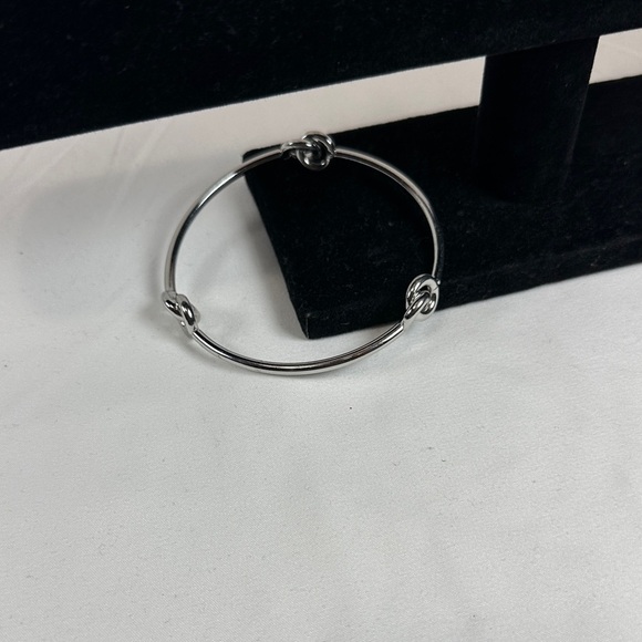 Elegant Silver Tone Knot Bracelet - Picture 3 of 7